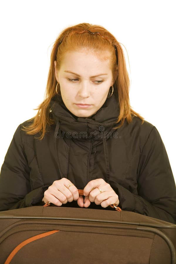 Sad red woman with a suitcase