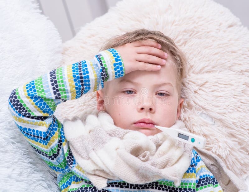 Sad Sick Boy with Thermometer Laying in Bed Stock Image Image of
