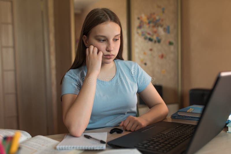 Sad and Tired, Teenager Girl of 12-14 Years Old, Watching Videos Home, Laptop Lessons