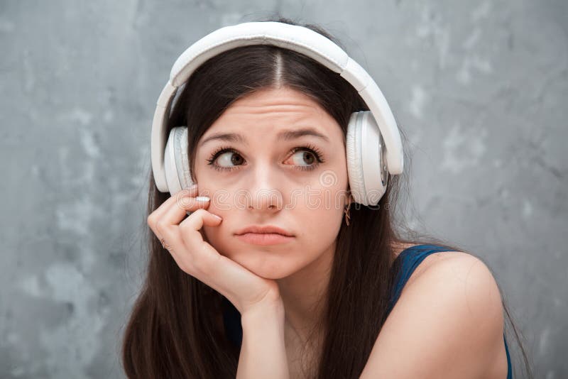 Sad woman with headphones stock photo. Image of headphones 90991850