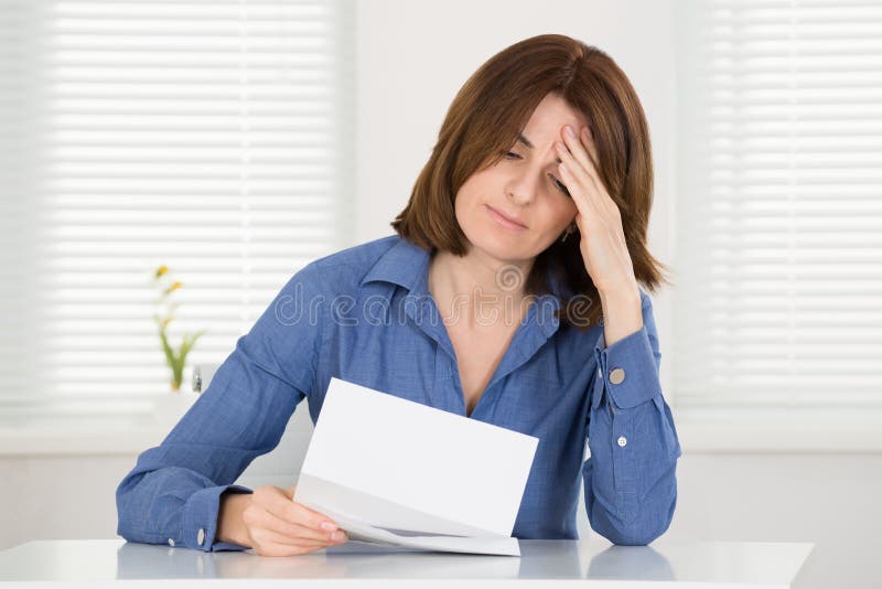 Sad Woman Reading Document