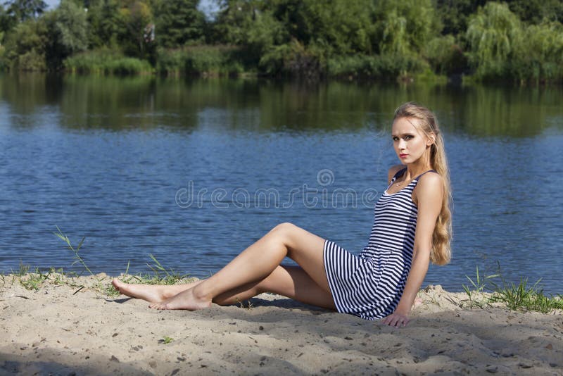 Sad woman on the beach stock photos Sad woman on the beach stock photos