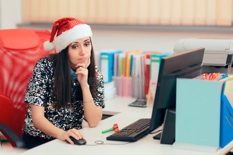 Sad Woman Spending Christmas Holiday at the Office