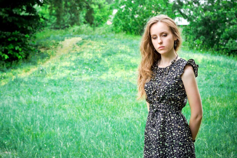 Sad Woman Stays in a Forest Stock Photo - Image of garden, leaf: 33462518