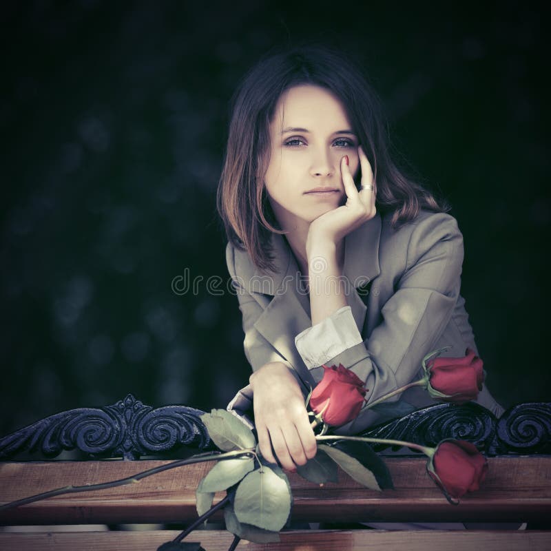 Sad Girl with Red Rose by Ayya Saparniyazova