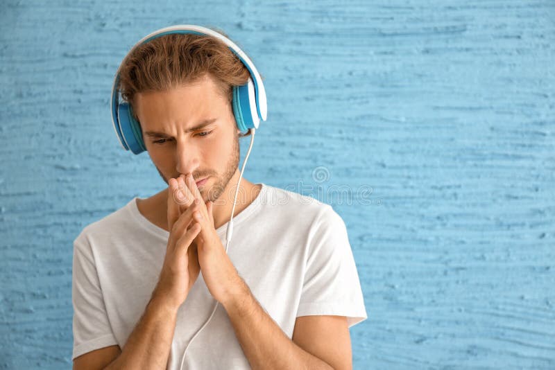 Man Listening To Sad Song Stock Photos - Free & Royalty-Free Stock Photos  from Dreamstime