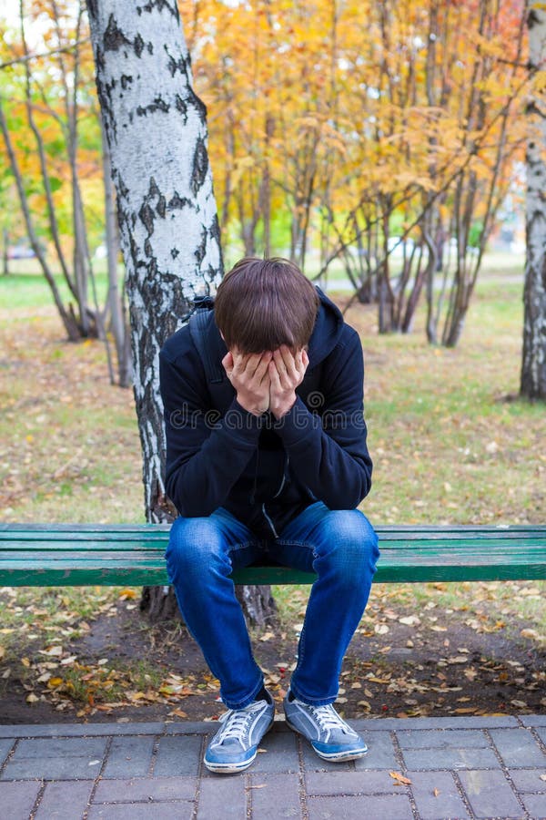 Sad Young Man outdoor stock image. Image of outdoor, male - 66034183