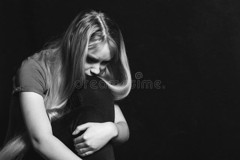 Sad Young Woman Going To Cry in a Black Background Stock Photo - Image of  depressed, dark: 146496402