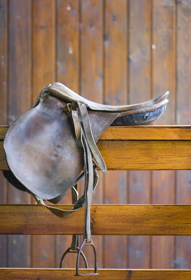 Saddle on a railing stock photos