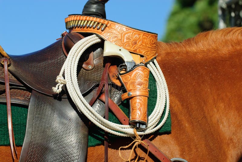 Saddle, Rope and Gun stock photo. Image of horse, cowboy 11287834