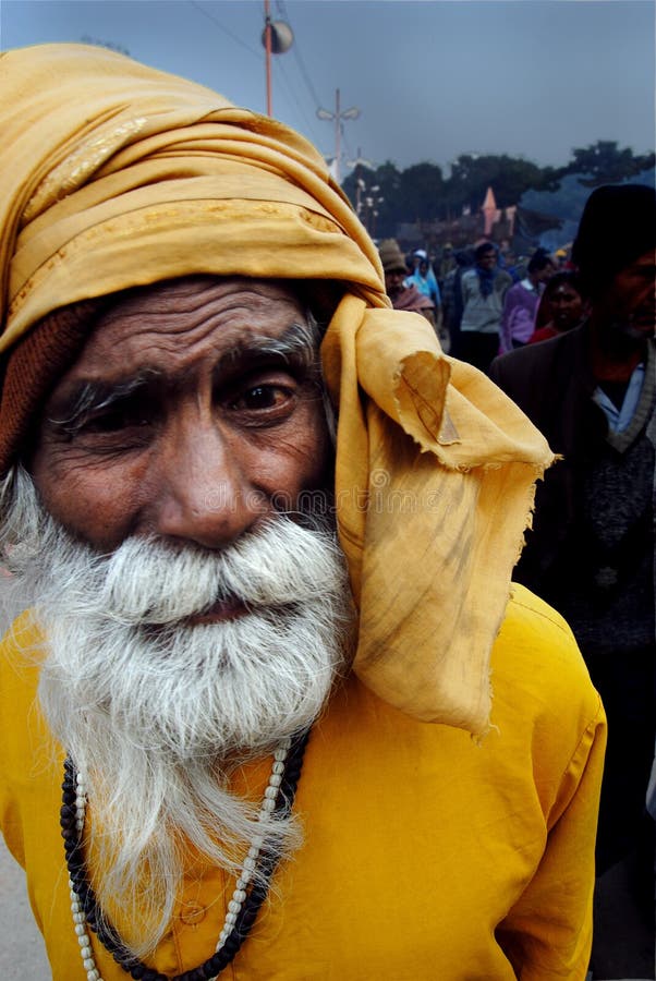 January 13, 2011-Ganga sagar, West Bengal, India –A portrait of a saint at the fair ground of Ganga sagar. Gangasagar Mela is the largest fair, celebrated in West Bengal (INDIA). This fair is held where the Ganga river and the Bay of Bengal form a nexus. Hence the name Gangasagar Mela. minor motion blur and noise visible. January 13, 2011-Ganga sagar, West Bengal, India –A portrait of a saint at the fair ground of Ganga sagar. Gangasagar Mela is the largest fair, celebrated in West Bengal (INDIA). This fair is held where the Ganga river and the Bay of Bengal form a nexus. Hence the name Gangasagar Mela. minor motion blur and noise visible