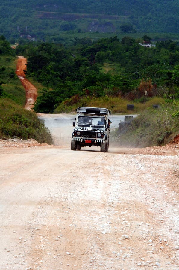 Safari jeep on dirt road
