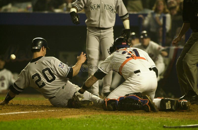 Catcher Jorge Posada slides safely into home plater scoring the go ahead run in Game 5 of the 2000 World Series. (Image taken from color slide.). Catcher Jorge Posada slides safely into home plater scoring the go ahead run in Game 5 of the 2000 World Series. (Image taken from color slide.)