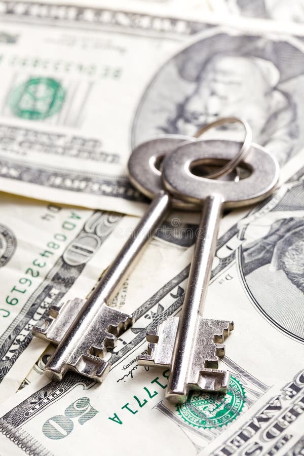Safe key with money stock image. Image of economics, 22261859