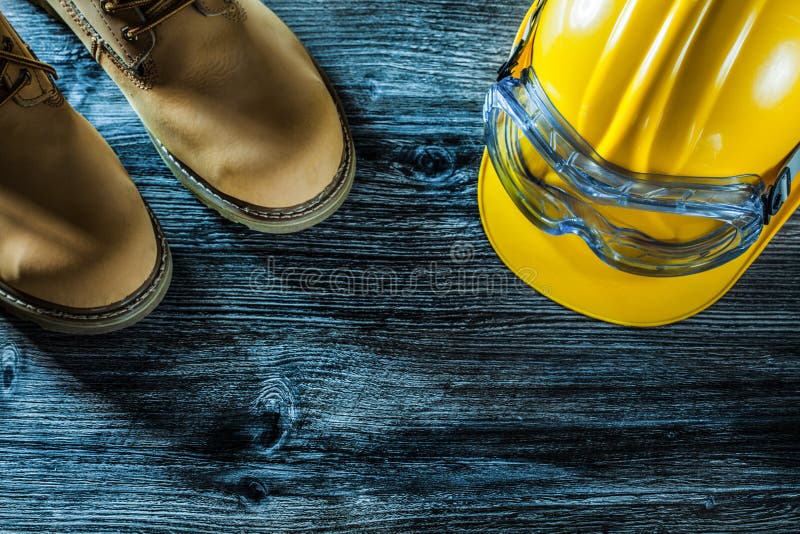 Safety Glasses Boots Hard Hat on Wooden Board Stock Photo Image of