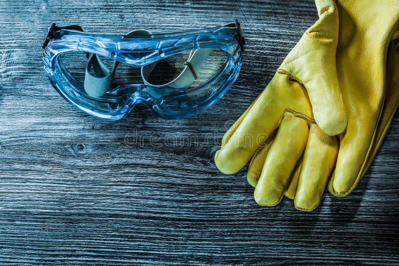 Safety Gloves Goggles on Wooden Board Stock Image Image of workwear