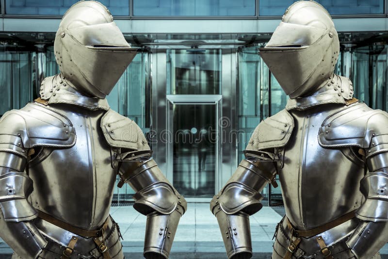 Safety. Medieval armor protecting a business building. Concept of stock photography