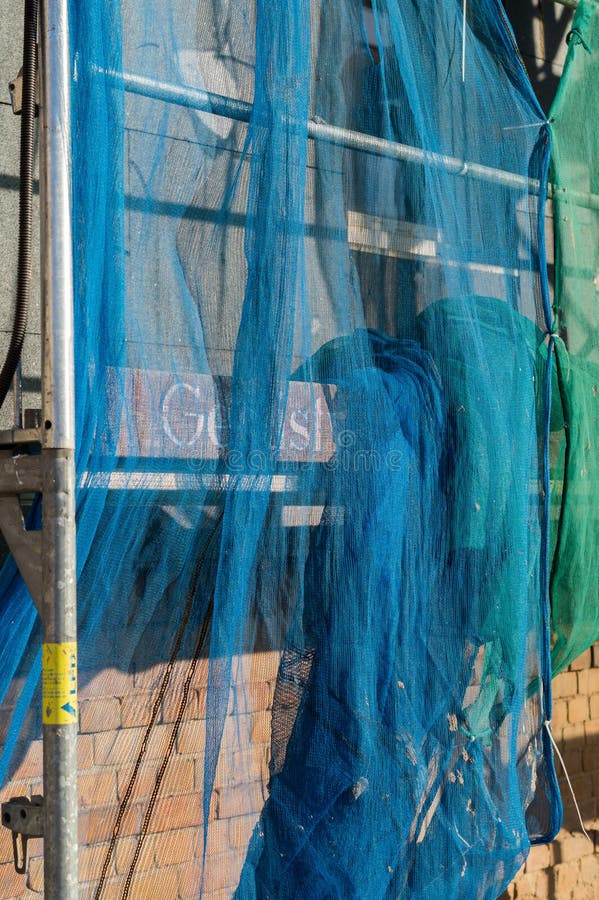 Safety net for scaffolding construction stock photos