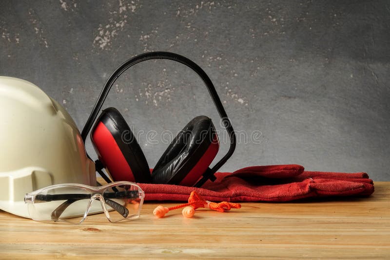 Safety Personal Protective EquipmentPPE on a rustic black background royalty free stock photography