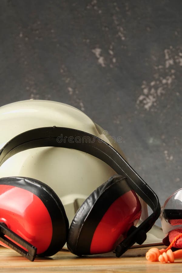 Safety Personal Protective EquipmentPPE on a rustic black background royalty free stock photo