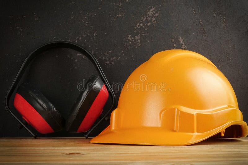 Safety Personal Protective EquipmentPPE on a rustic black background. stock photo