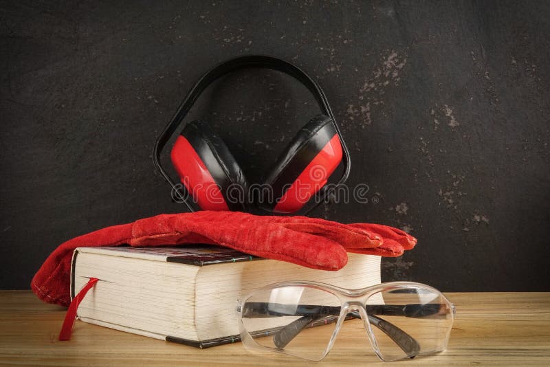 Safety Personal Protective EquipmentPPE on a rustic black background. royalty free stock photo