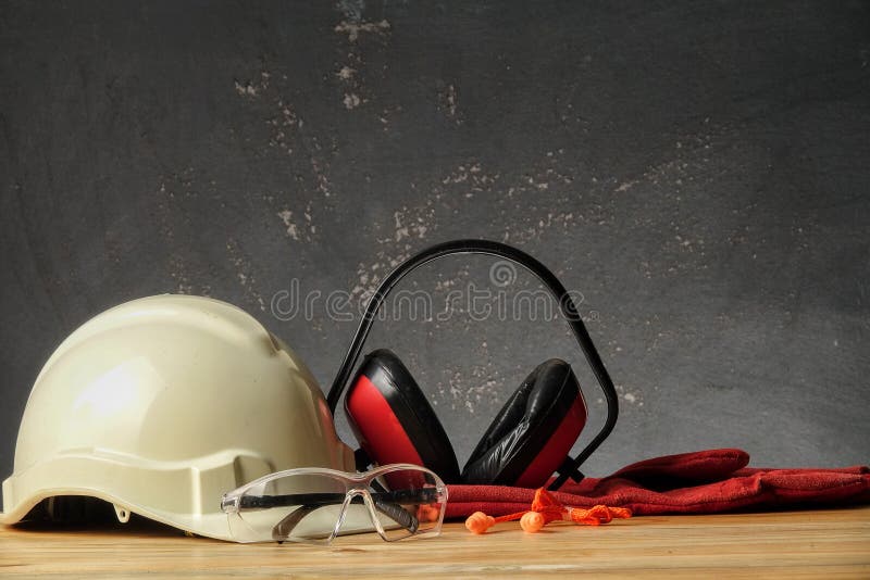 Safety Personal Protective EquipmentPPE on a rustic black background royalty free stock photography