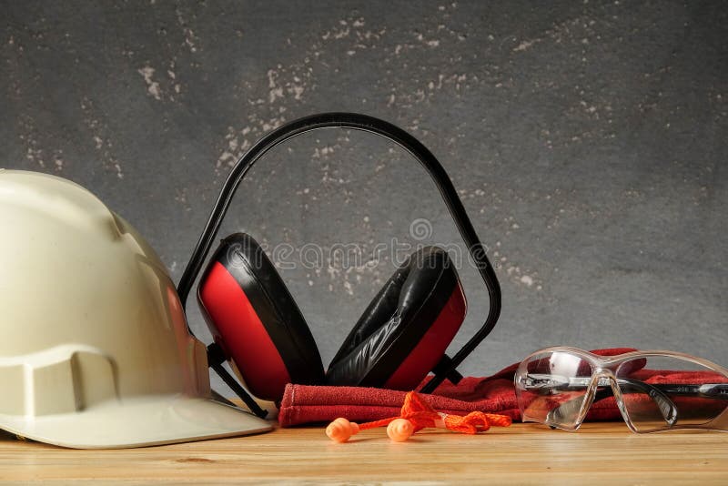 Safety Personal Protective EquipmentPPE on a rustic black background stock images