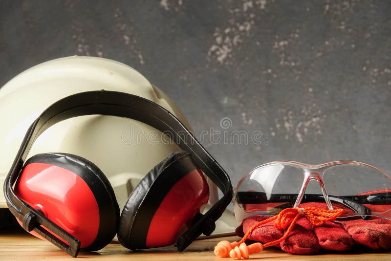 Safety Personal Protective EquipmentPPE on a rustic black background stock images