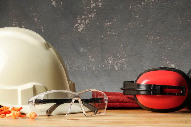 Safety Personal Protective EquipmentPPE on a rustic black background royalty free stock photo