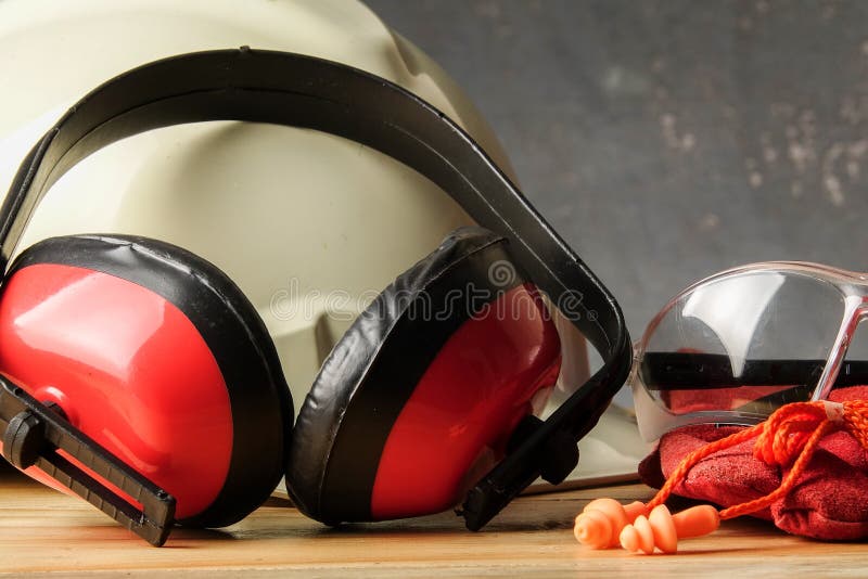 Safety Personal Protective EquipmentPPE on a rustic black background stock image