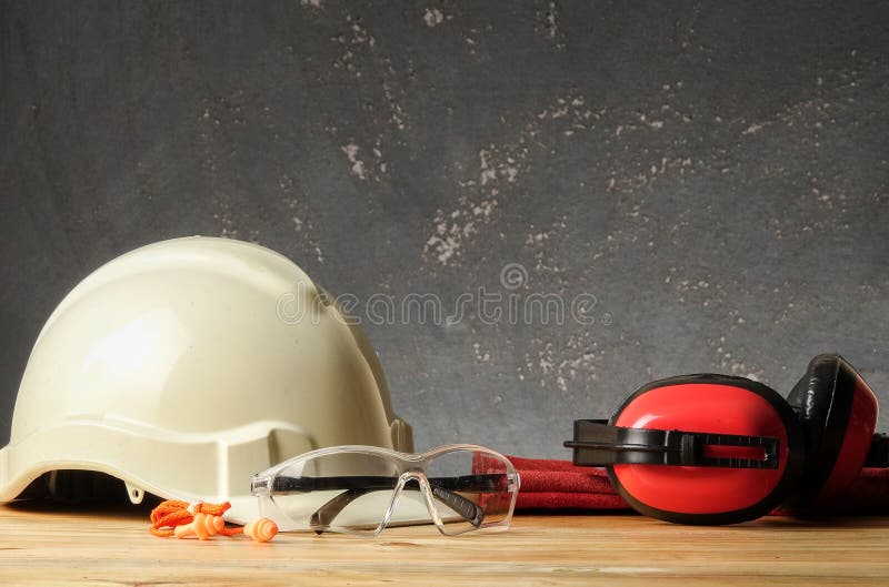 Safety Personal Protective EquipmentPPE on a rustic black background stock photos