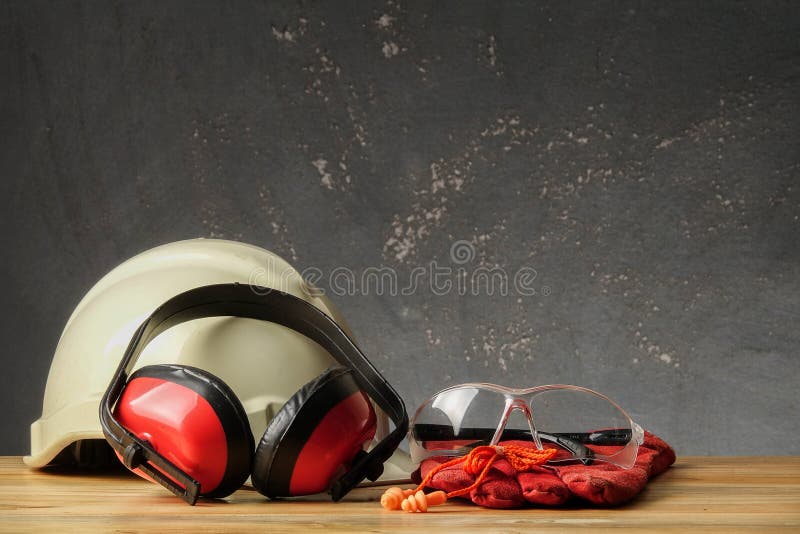 Safety Personal Protective EquipmentPPE on a rustic black background stock photo