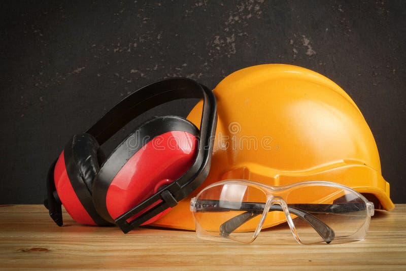 Safety Personal Protective EquipmentPPE on a rustic black background. stock image