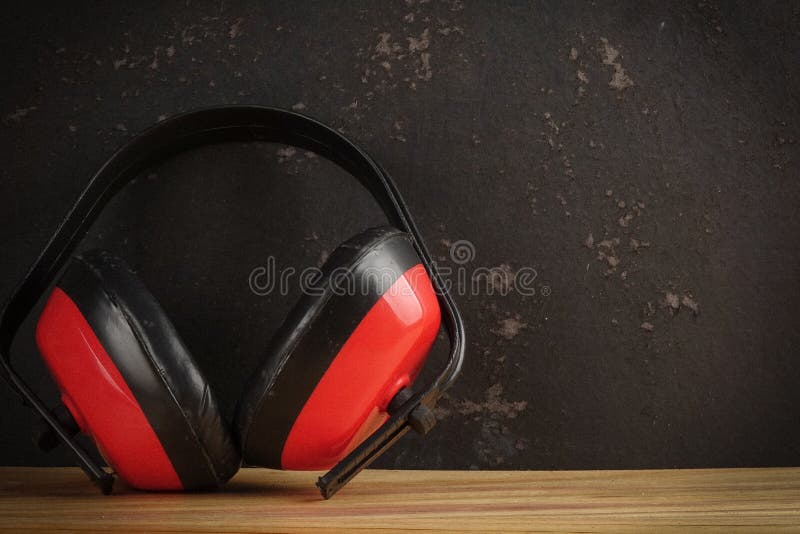 Safety Personal Protective EquipmentPPE on a rustic black background. royalty free stock image