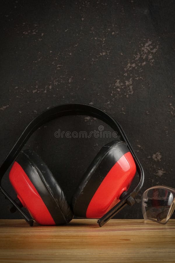 Safety Personal Protective EquipmentPPE on a rustic black background. stock image