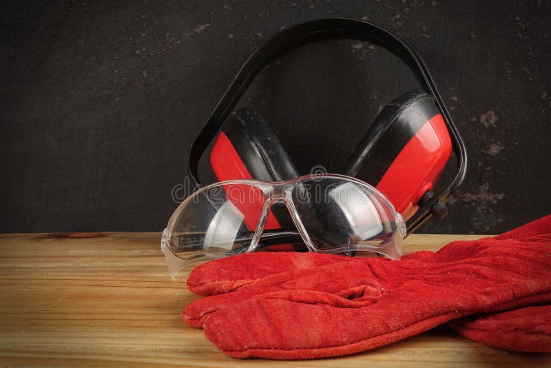 Safety Personal Protective EquipmentPPE on a rustic black background. royalty free stock photo