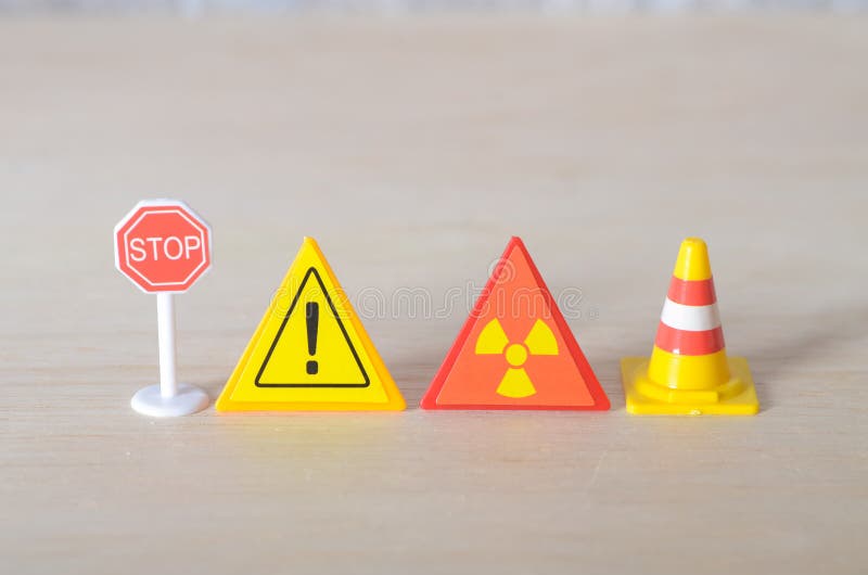Safety Signs and Warnings: STOP, Caution, and Radiation Alert Symbols vector illustration