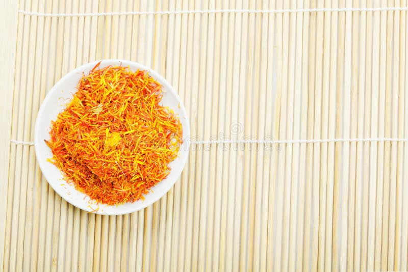 Saffron Leaves Spice in Saucer on Mat Above View Stock Image Image of