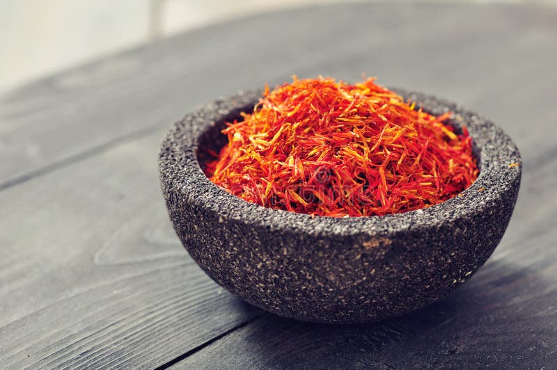 Saffron in stone bowl stock photo. Image of intense, curry 36999476