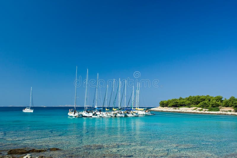 Sail boats docked in beautiful bay, Adriatic sea