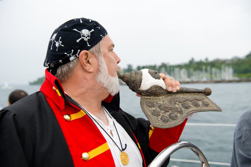 Sailboat Captain Blowing Horn Stock Photo Image of caucasian