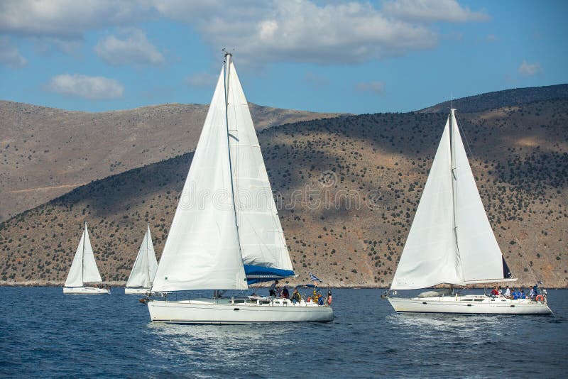 Sailboat participate in sailing regatta 12th Ellada Autumn 2014 among Greek island group in the Aegean Sea