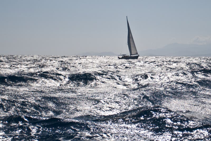 sailboat in rough seas