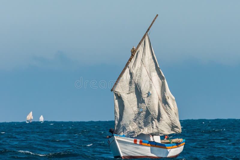Sailboat torn sails peruvian coast Piura Peru. Sailboat with torn sails in the peruvian coast at Piura Peru stock photo