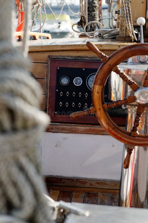 Sailboat wheel cockpit stock image. Image of instrument 19927841