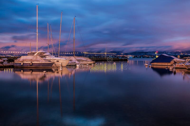 Sailboats at dawn royalty free stock images