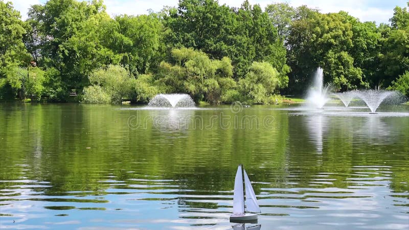 Sailing boat in pond