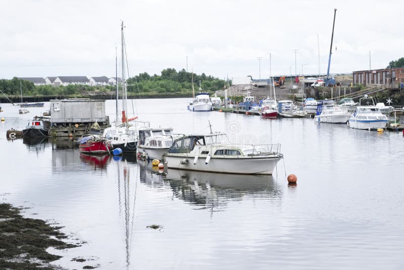 Sailing boats anchored at marina lake in Dumbarton