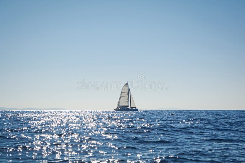 Sailing catamaran in the Aegean sea, Greece